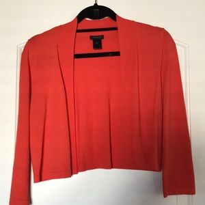 Light stretchy shrug sweater in bright orange